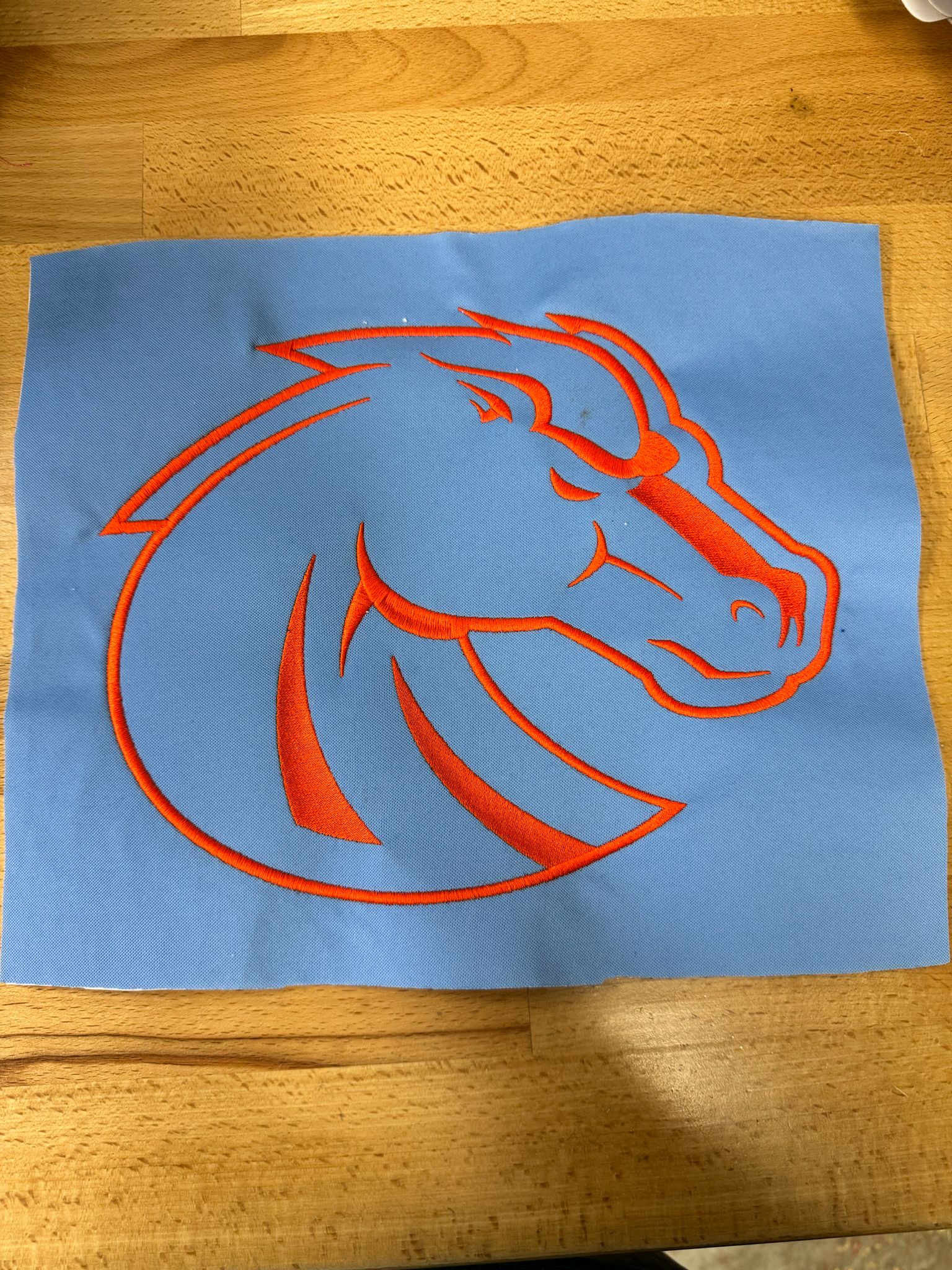 Custom logo embroidery on corporate polos